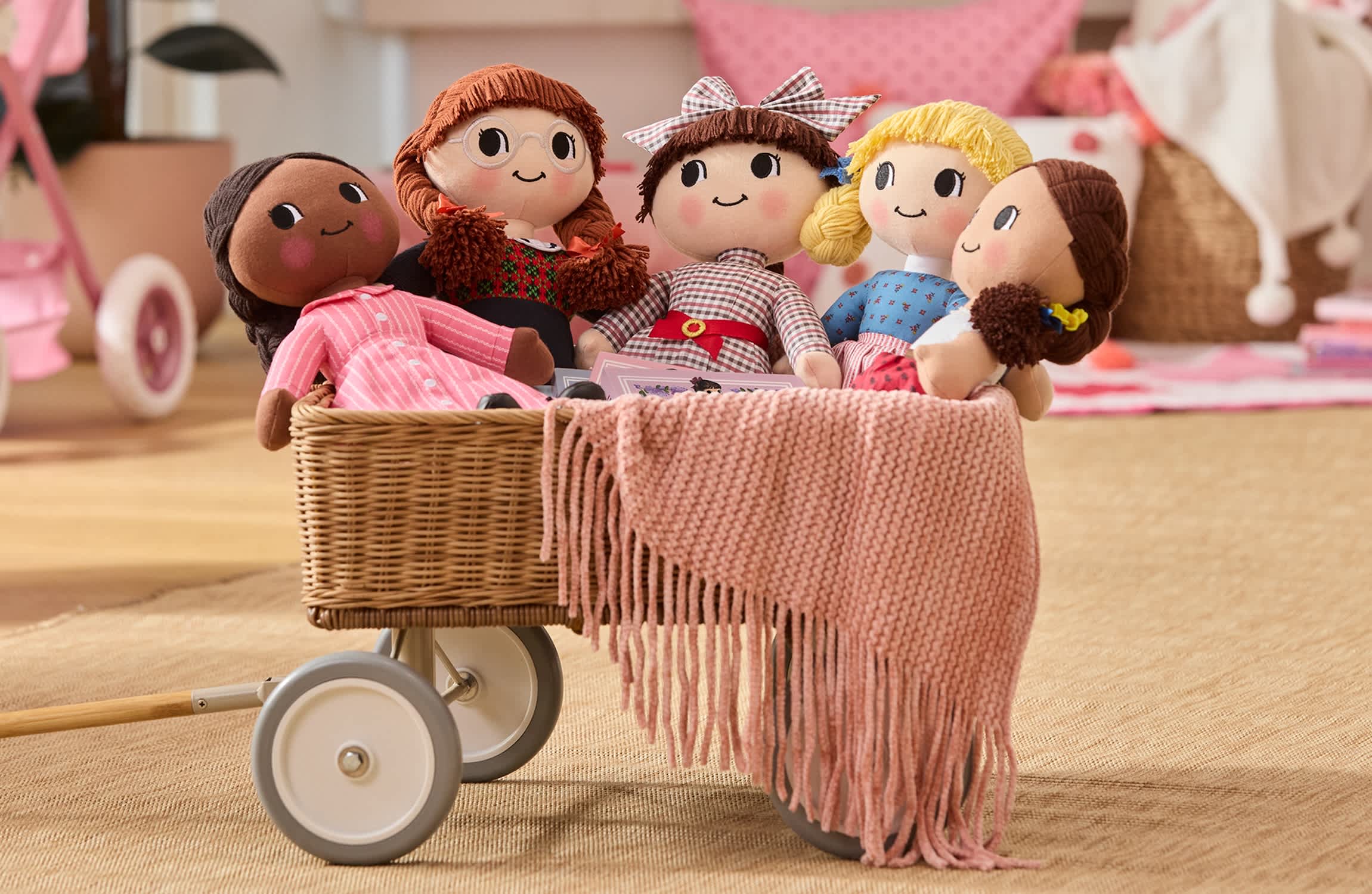 Collage of five plush historical character dolls